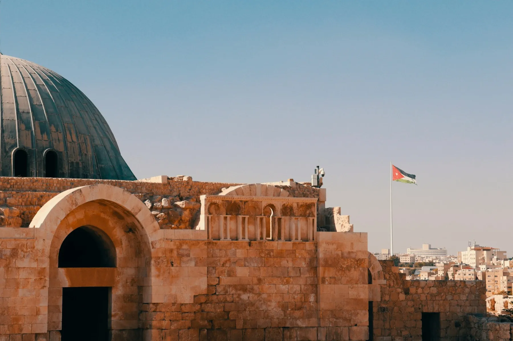 The Umayyad Palace on Amman Citadel, with the Jordanian flag